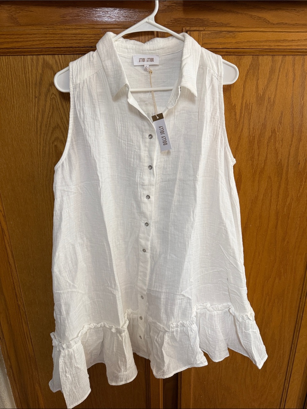 Sleeveless White Button-Front Ruffle-Hem Tunic